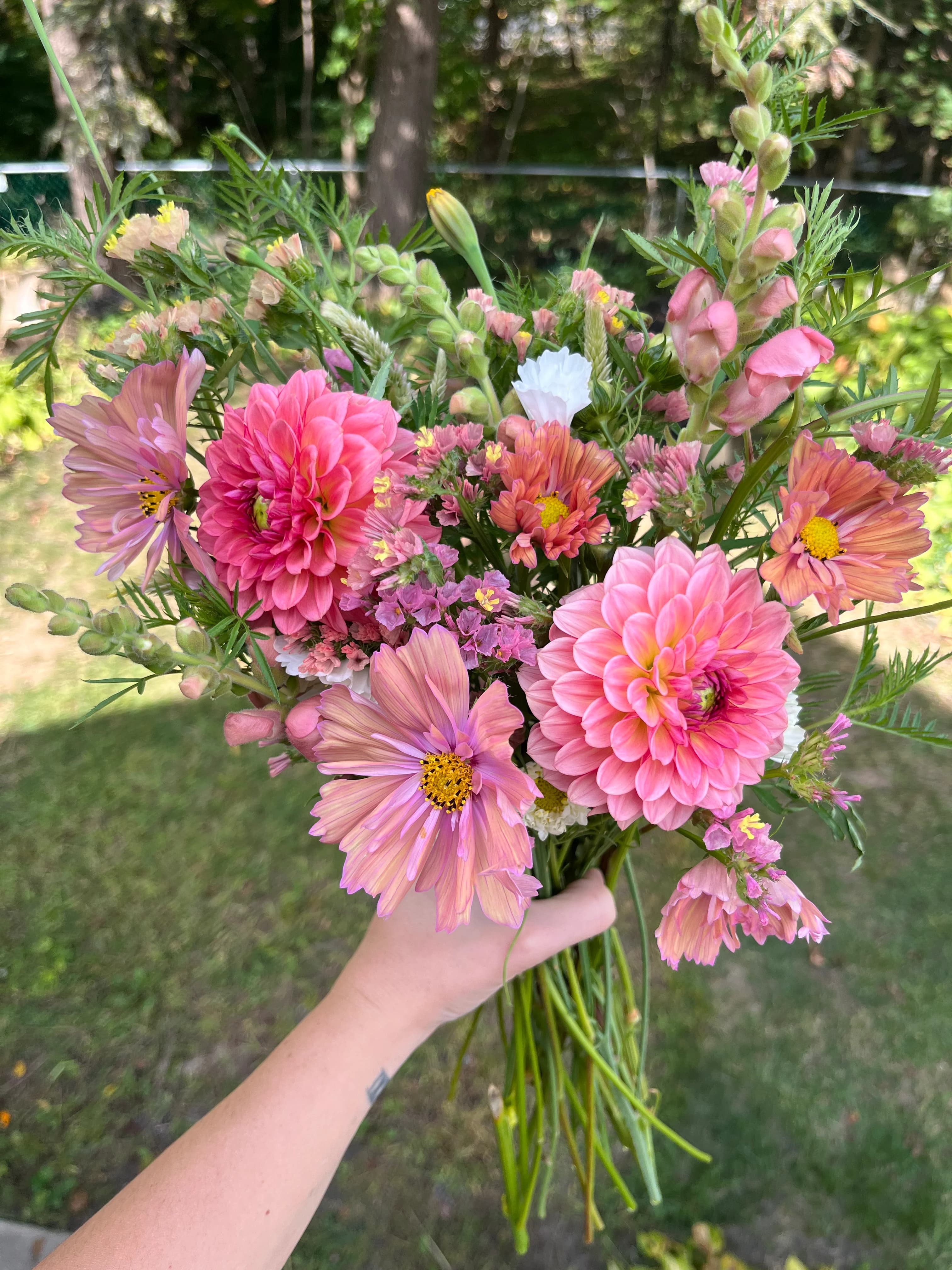 Garden-style bouquet with dahlias and cosmos
