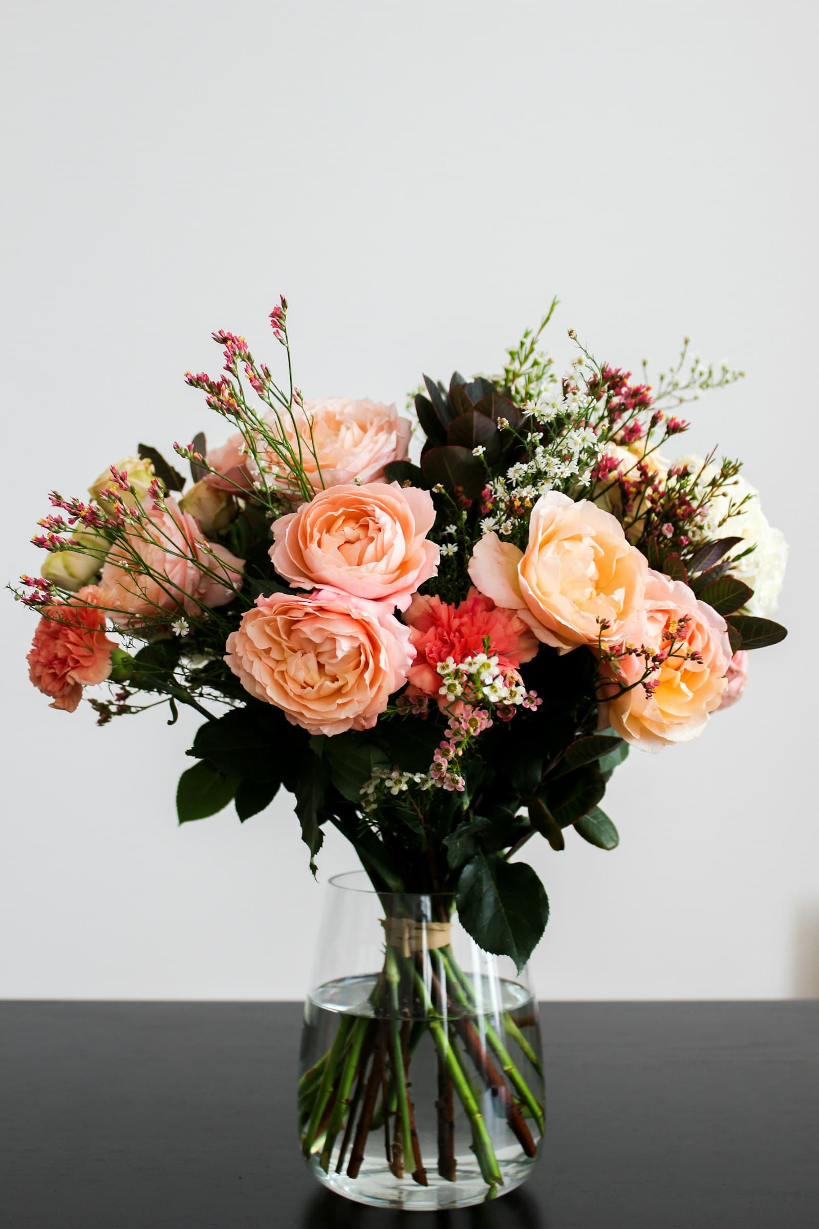 Pastel bouquet arranged in a glass vase